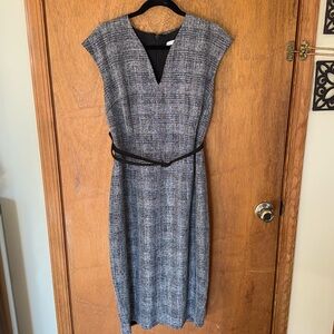 Dress by New York and Company stretch size 14, black and white with a belt.